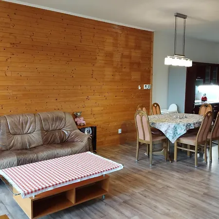 V Dřevěném Domě Apartamento