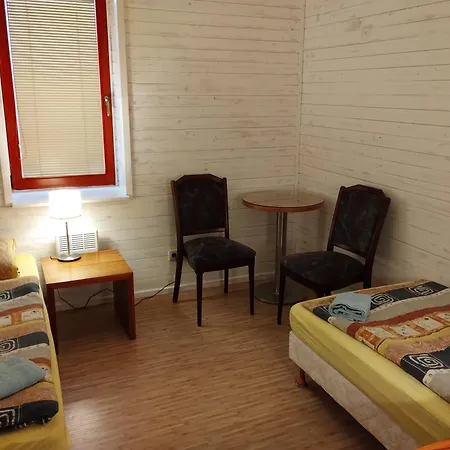 V Dřevěném Domě Apartamento *