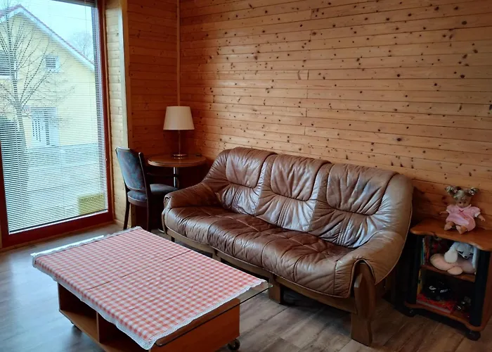 V Dřevěném Domě Apartamento