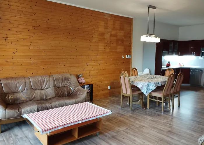 V Dřevěném Domě Apartamento