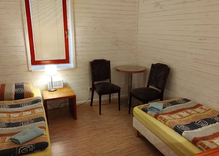 V Dřevěném Domě Apartamento *